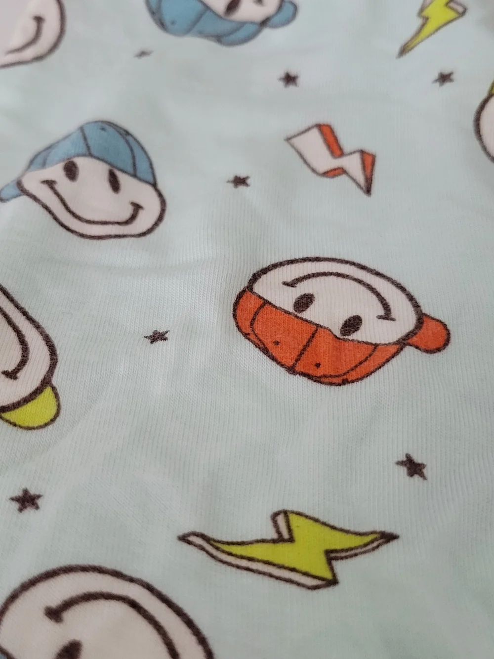 Sleep On It Light Blue Smiley Face Print Footie with Orange and Yellow Accents